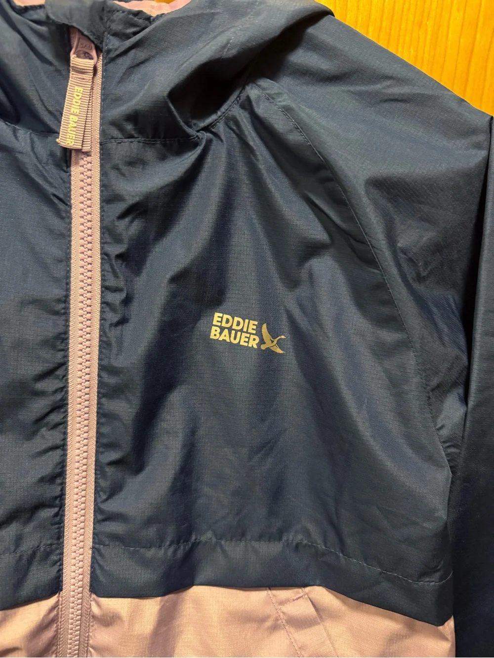 NWOT Kids Eddie Bauer two toned windbreaker. Full zip, size kids Medium.